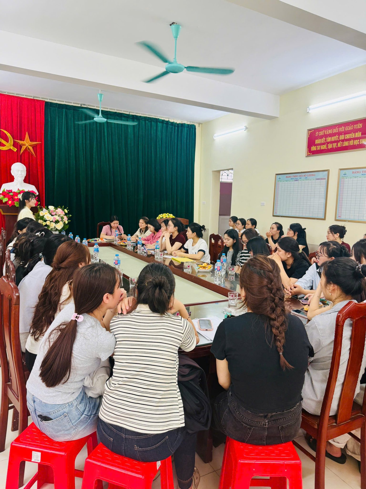 May be an image of one or more people, people studying and text
